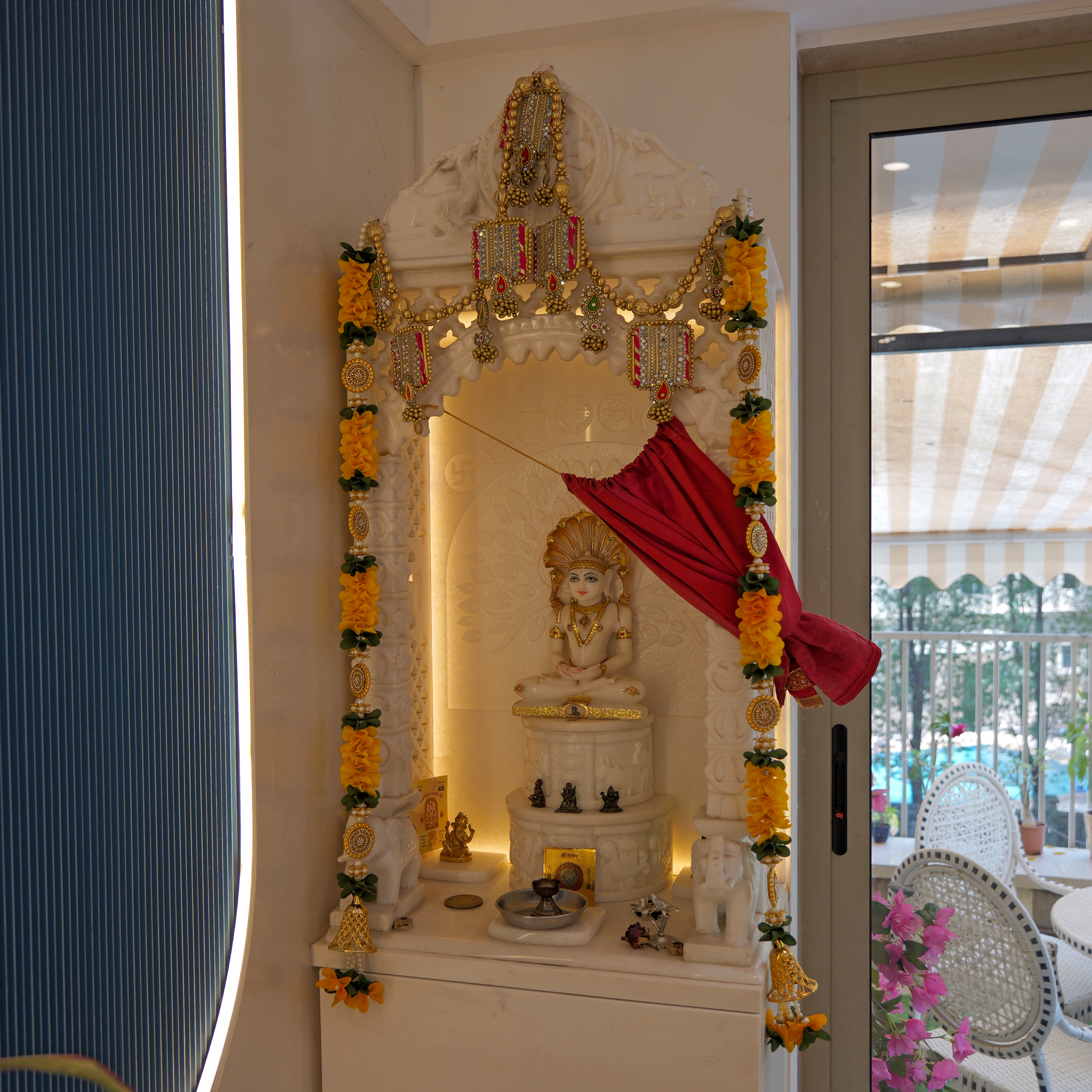 Dental clinic reception with spiritual temple corner in Powai Mumbai for peaceful environment
