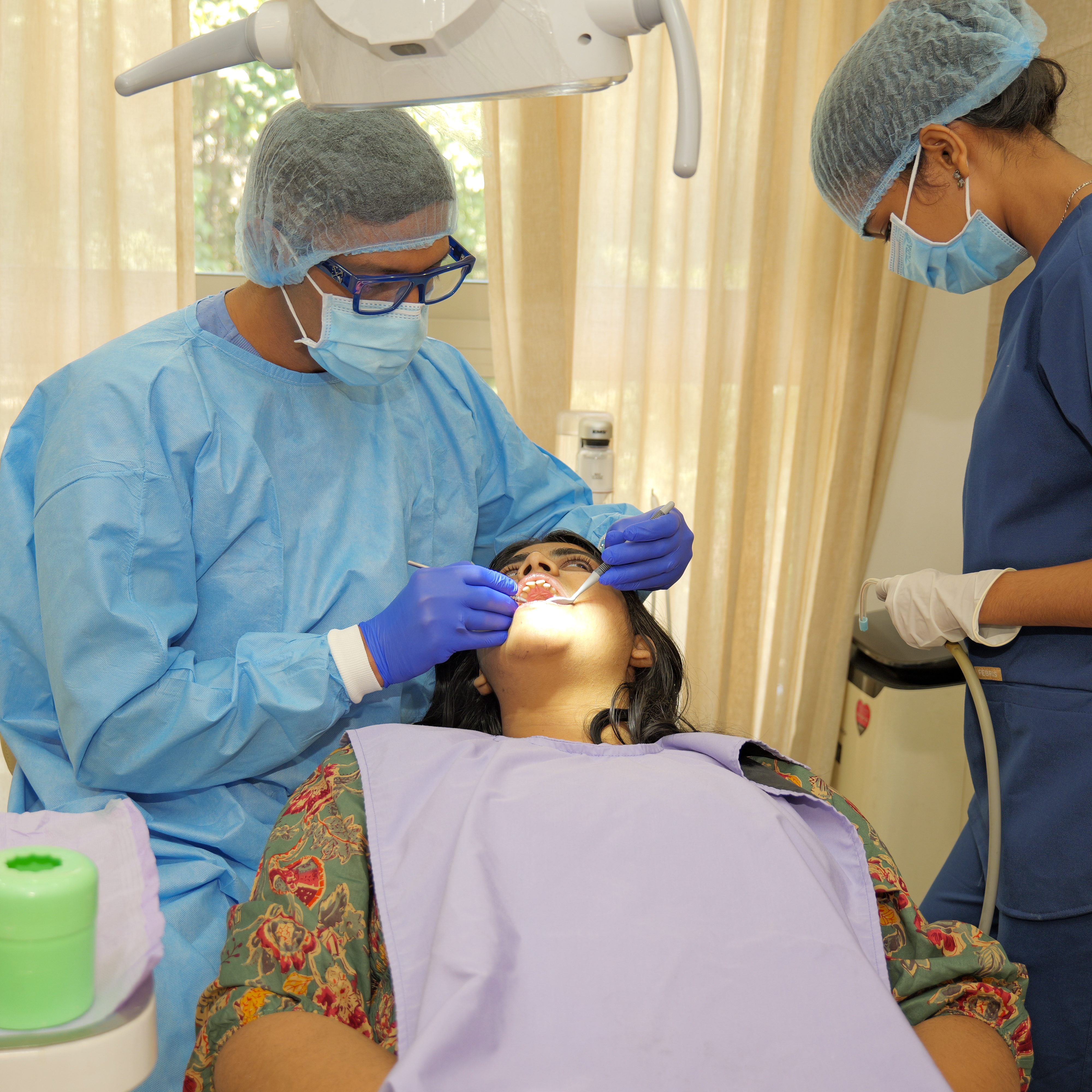 Dental surgery team performing painless dental treatment in Powai Mumbai clinic